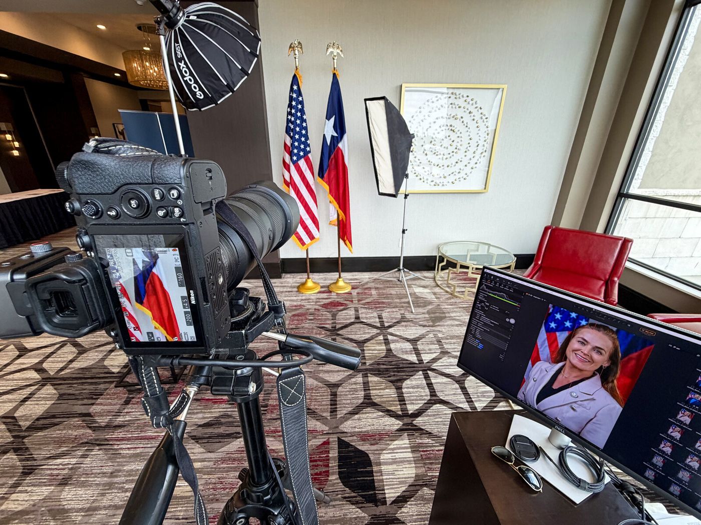 Tethered laptop showing a headshot moments after it was taken during an on-site Dallas corporate session